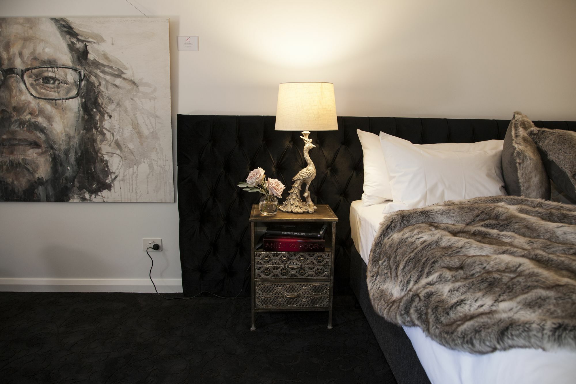 Daylesford Art Motel Exterior photo A bedroom with a mink throw